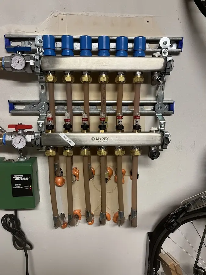 Plumber performing Water Heater Repair at a residential property in Evansville